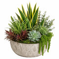 Plante artificielle en pot 65 cm feuillage vert et jaune avec pot effet pierre décoratif